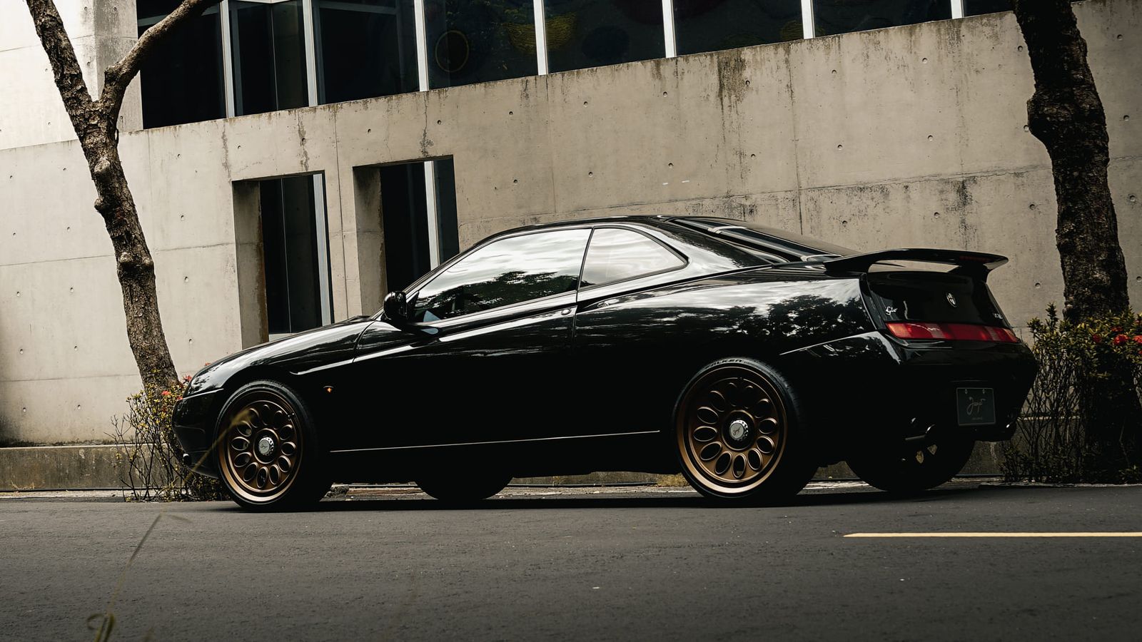 Alfa Romeo 916 GTV Black on Jaeges RA wheels